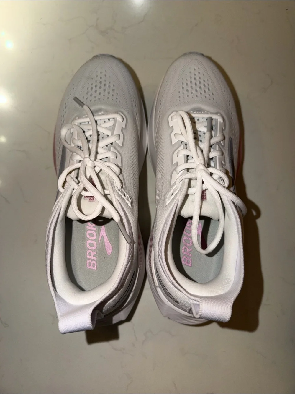 Brooks White Running Shoe with Pink Accent